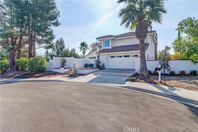 view of front of home with a garage