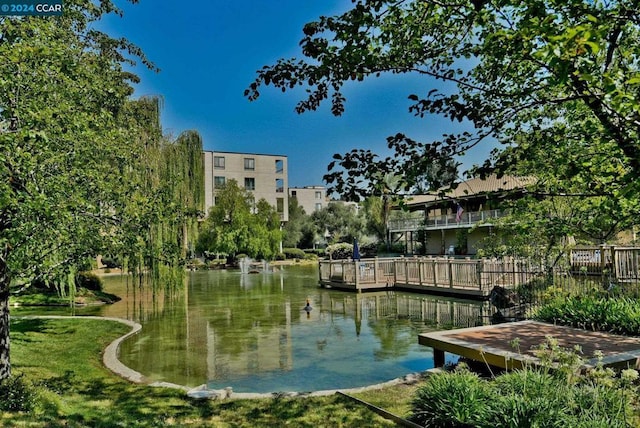 view of home's community featuring a water view