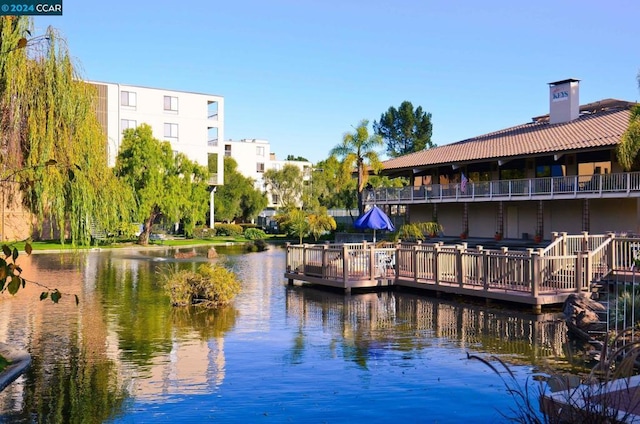 dock area featuring a water view