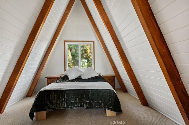 bedroom with light carpet and lofted ceiling with beams