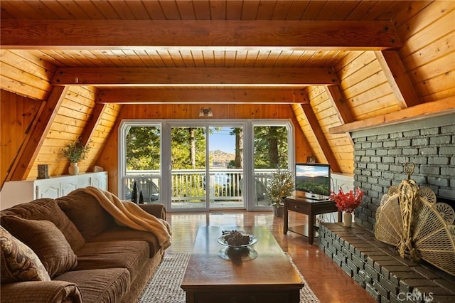 living room with lofted ceiling with beams, wood ceiling, and wooden walls