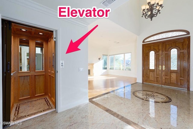 entrance foyer with crown molding