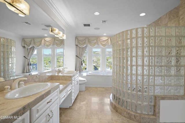 bathroom with ornamental molding, tile patterned floors, independent shower and bath, and vanity