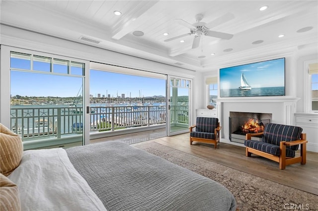 bedroom featuring access to outside, ceiling fan, crown molding, hardwood / wood-style flooring, and beamed ceiling