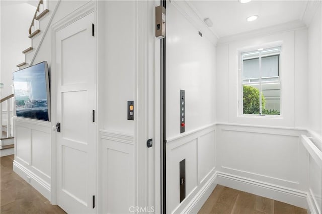 930 E Balboa Blvd, Newport Beach, CA 92661 - elevator with a decorative wall, wainscoting, and ornamental molding
