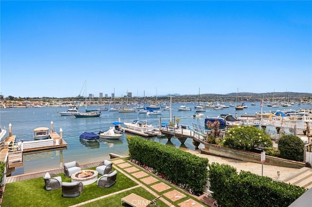 property view of water featuring a boat dock