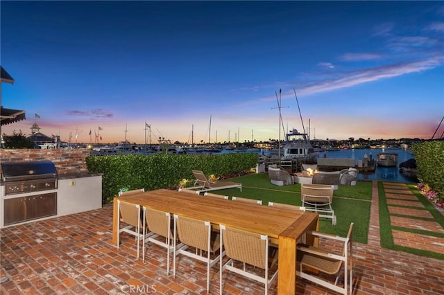 930 E Balboa Blvd, Newport Beach, CA 92661 - view of patio featuring outdoor dining area and a water view