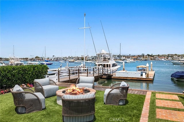 930 E Balboa Blvd, Newport Beach, CA 92661 - dock area featuring a fire pit and a water view