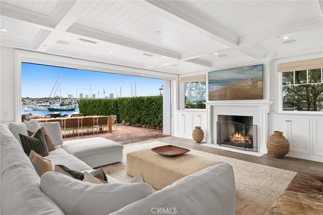 930 E Balboa Blvd, Newport Beach, CA 92661 - living room with coffered ceiling, wood finished floors, beamed ceiling, a fireplace with flush hearth, and plenty of natural light