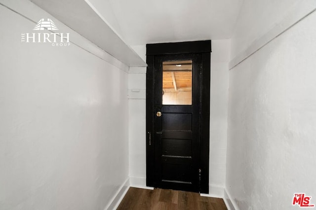 doorway to outside featuring dark hardwood / wood-style flooring