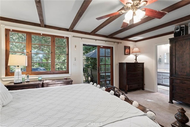 carpeted bedroom with ceiling fan, connected bathroom, access to outside, and multiple windows