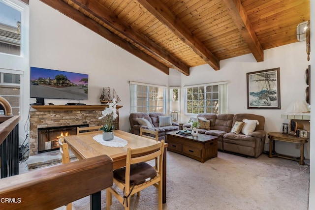 living room featuring a stone fireplace, light carpet, high vaulted ceiling, and wooden ceiling