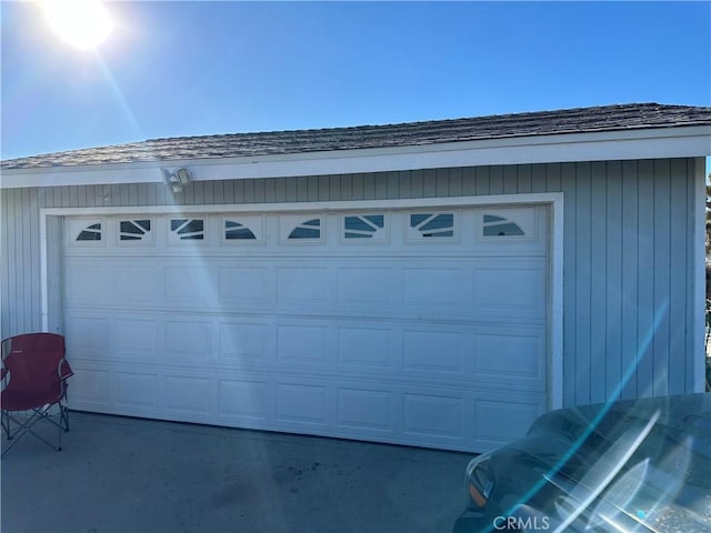 garage featuring driveway