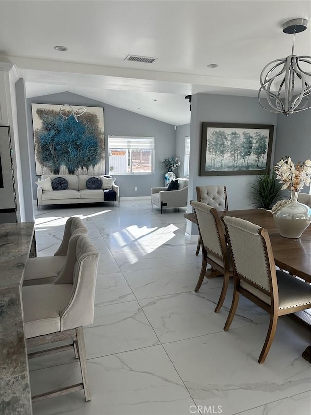 dining area featuring baseboards, visible vents, lofted ceiling, marble finish floor, and a notable chandelier