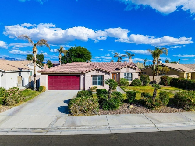 single story home with a garage