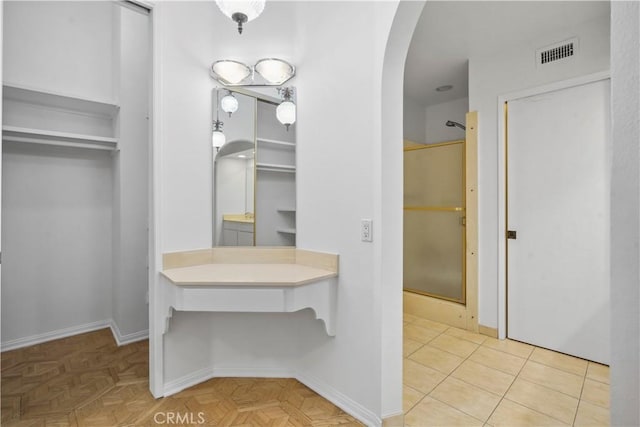 bathroom with parquet floors