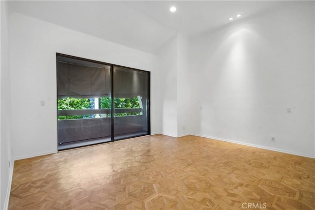 spare room featuring light parquet floors