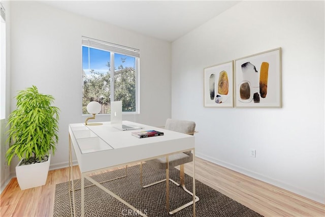 office space with hardwood / wood-style floors