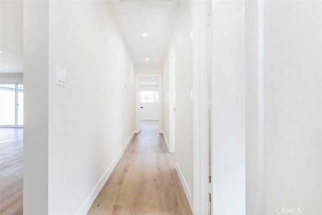 corridor featuring light wood-type flooring