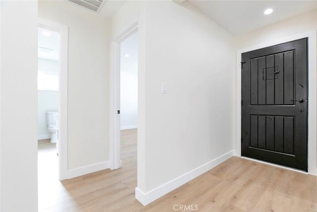 entrance foyer featuring light wood-type flooring