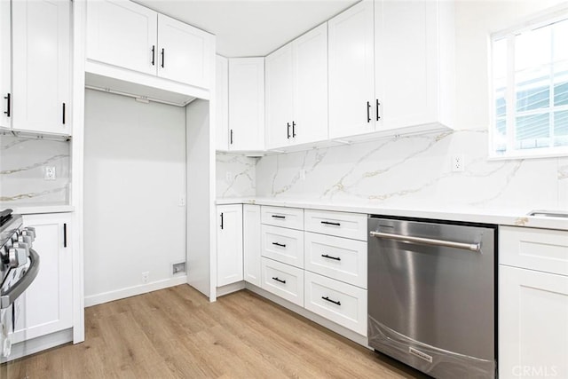 kitchen with white cabinetry, dishwasher, light hardwood / wood-style floors, and light stone counters