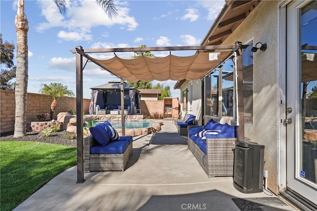 view of patio with outdoor lounge area and a fenced in pool