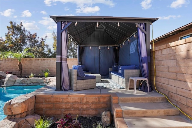 view of patio / terrace with a gazebo, a fenced in pool, and outdoor lounge area