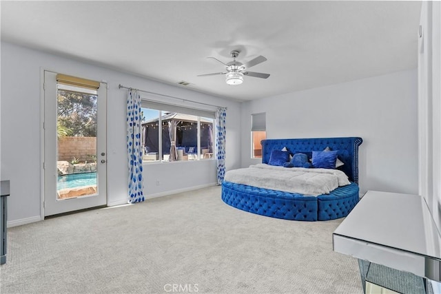 carpeted bedroom with access to outside and ceiling fan