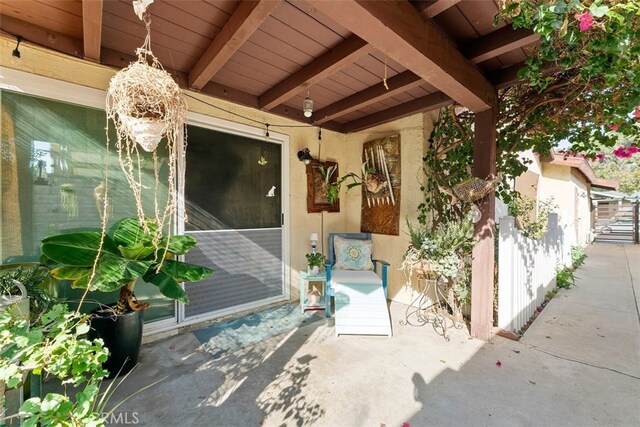 property entrance featuring a patio