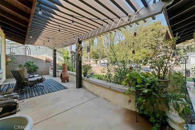 view of patio / terrace featuring a pergola