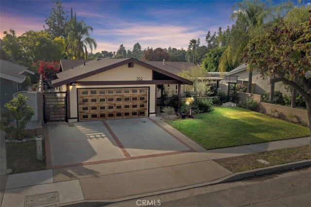 view of front of home featuring a lawn