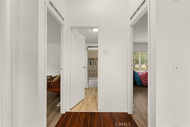 hall featuring hardwood / wood-style flooring