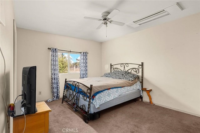 carpeted bedroom with an AC wall unit and ceiling fan