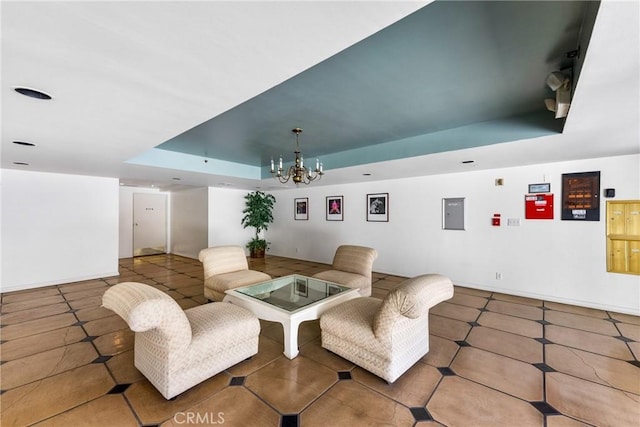 interior space featuring a chandelier and a tray ceiling