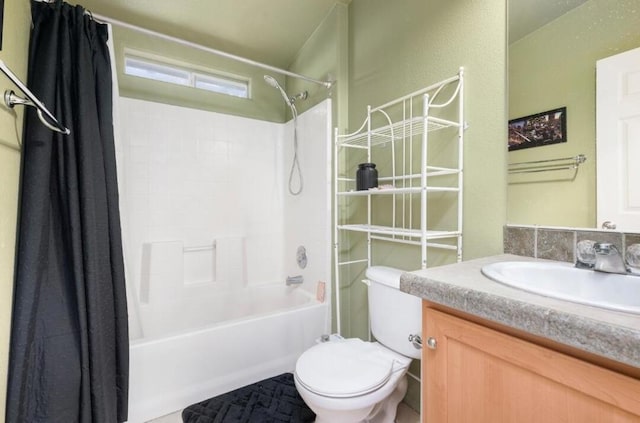 full bathroom featuring toilet, vanity, and shower / tub combo