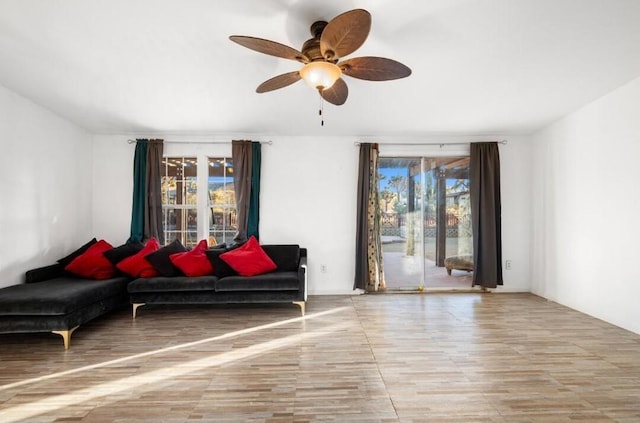 living room featuring ceiling fan