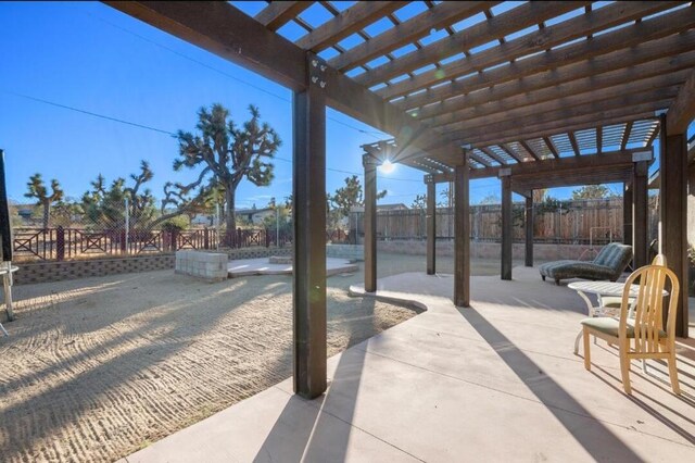 view of patio featuring a pergola