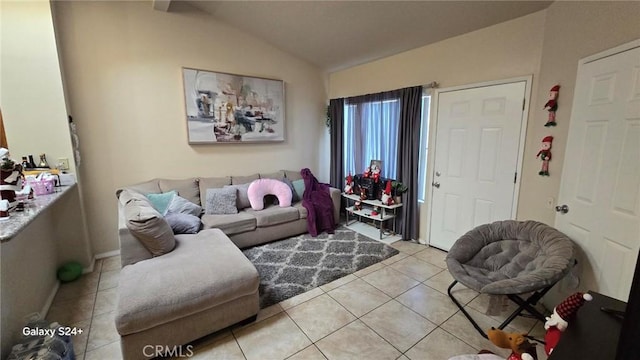 tiled living room with lofted ceiling