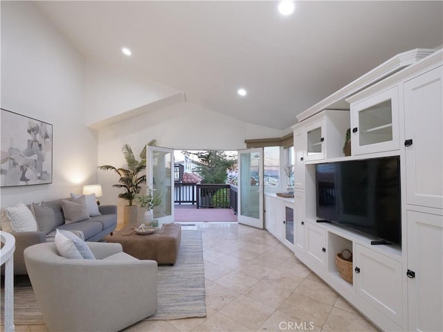 living room featuring high vaulted ceiling and recessed lighting