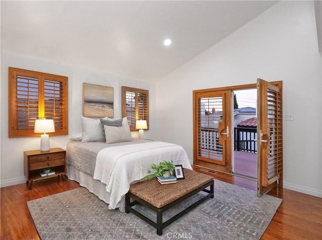 bedroom with baseboards, wood finished floors, access to outside, vaulted ceiling, and recessed lighting