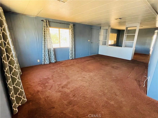 spare room with carpet