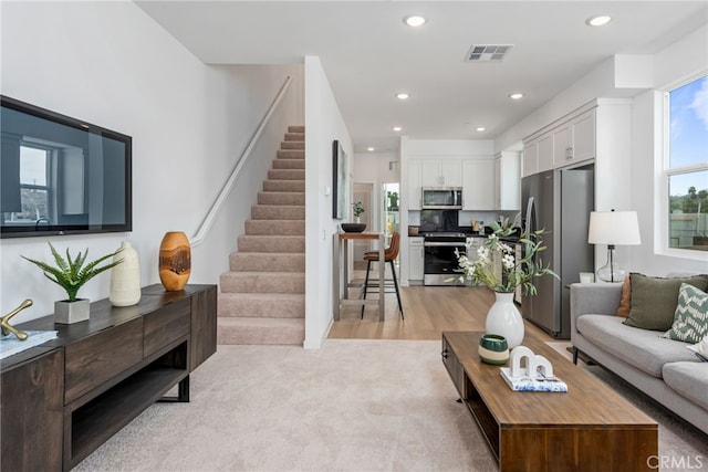 living room featuring light wood-type flooring