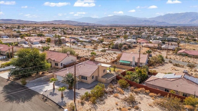 bird's eye view with a mountain view