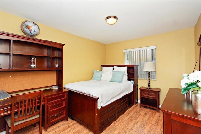 bedroom with light wood-type flooring