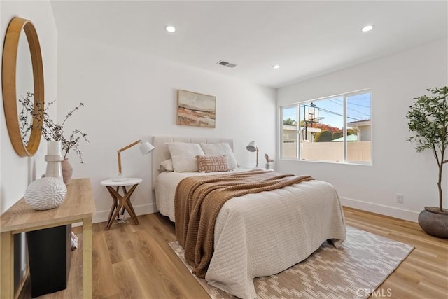 bedroom featuring light hardwood / wood-style flooring