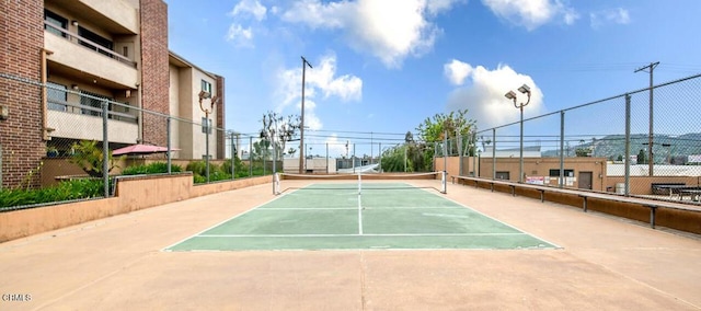 view of sport court featuring basketball court