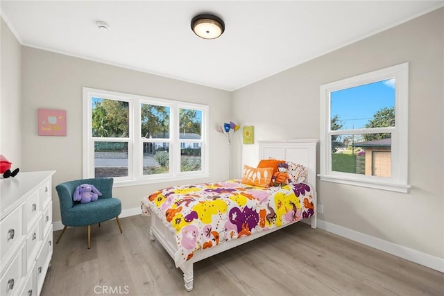 bedroom featuring light hardwood / wood-style flooring