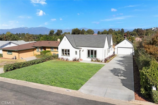 ranch-style house featuring a front yard and a mountain view