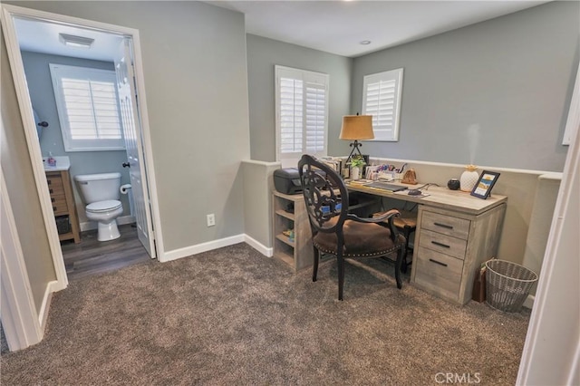 carpeted office space featuring a wealth of natural light