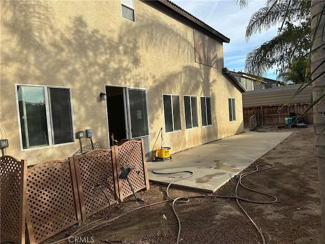 rear view of house featuring a patio area